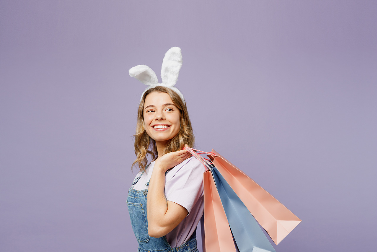 Female with bunny ears and shopping bags