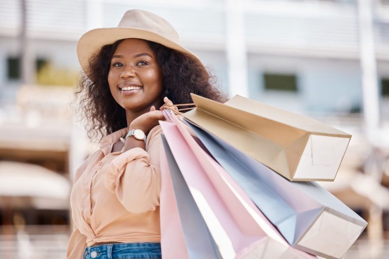 woman with retail shopping bags